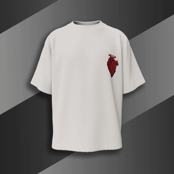 alt="White oversized t-shirt with bold red anatomical heart and black gothic wings graphic, BoldMunk EST. 2025 design on the back"