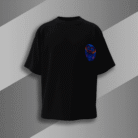 “Black oversized t-shirt with vibrant blue and orange Japanese Daruma doll design on the back, minimal front chest logo, Bold Munk streetwear”